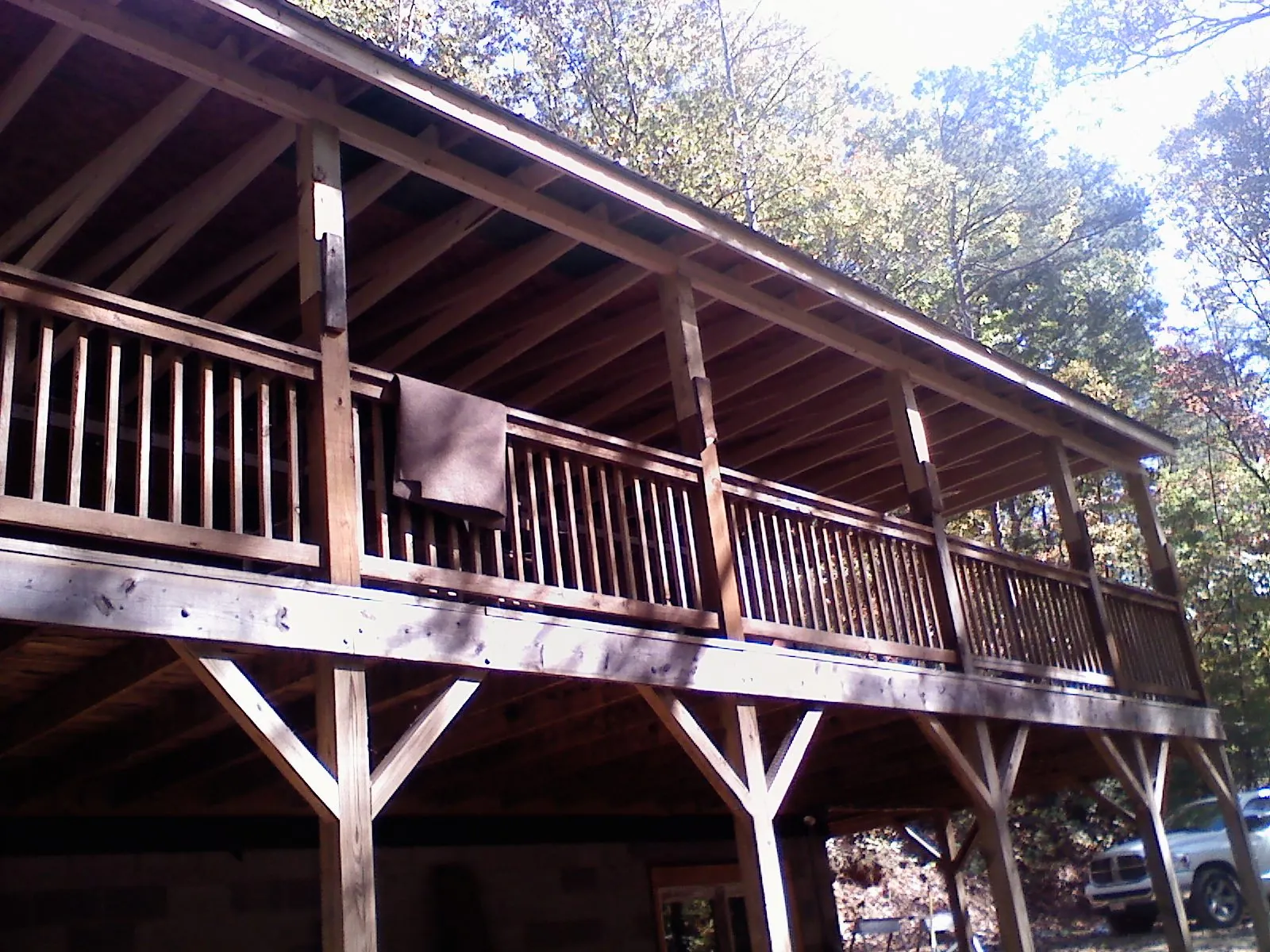 Timber framing under a new elevated porch and deck — Roof Leak Repair in New Providence by Roofing Brothers